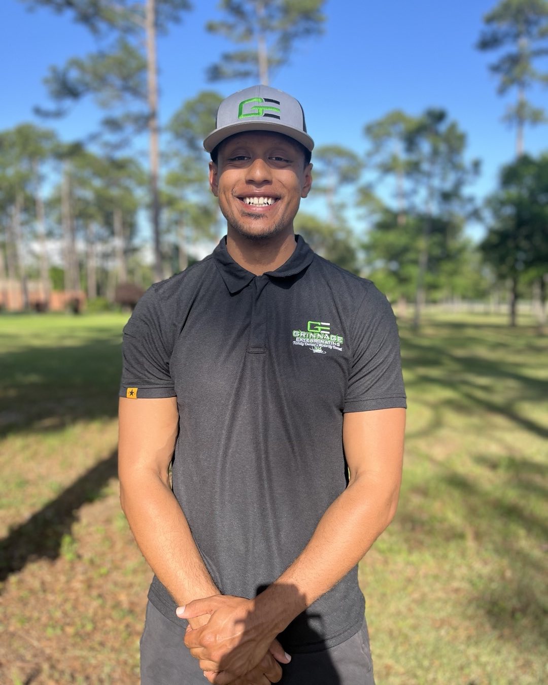 Keith Grinnage's son, co-owner and technician at Grinnage Exterminating, in branded company uniform.